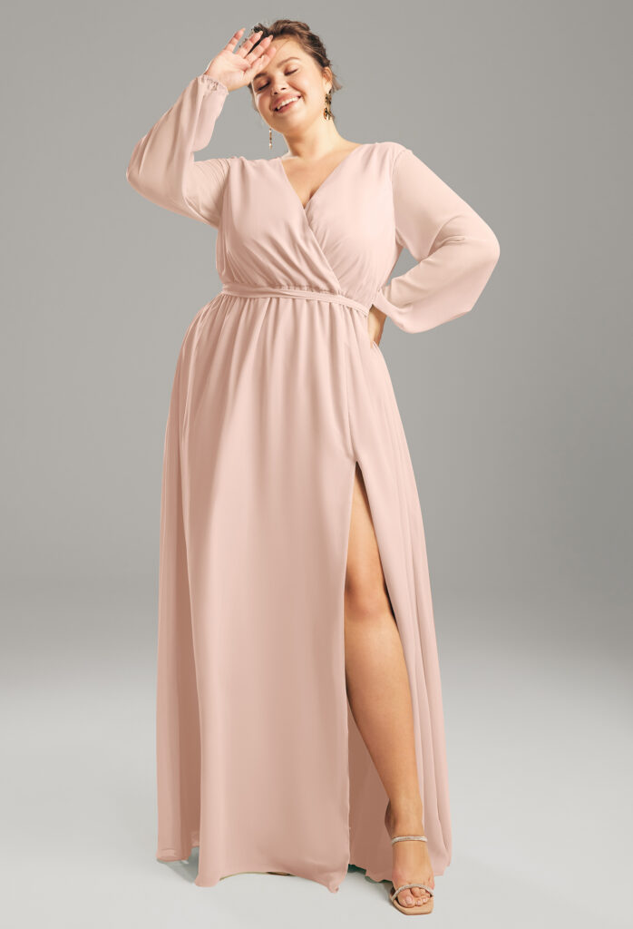 A long-sleeved dress with a wrap design and a daring thigh-high slit.