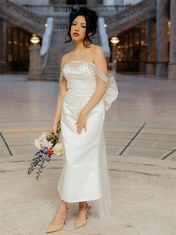 The AW Seraphina Wedding Dress combines classic elegance with modern flair for a timeless look.