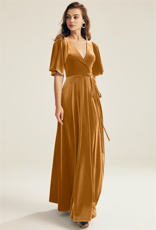 Shine in this gold velvet wrap dress, perfect for adding a touch of glamour to any winter event.